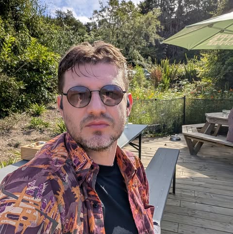 Igor Vaschuk outdoors wearing a patterned shirt
