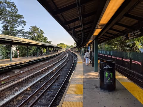 Sunlight falling across an elevated railway station